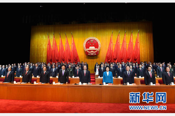 10月1日，慶祝中華人民共和國成立66周年暨新疆維吾爾自治區成立60周年大會在新疆人民會堂隆重舉行。 新華社記者 饒愛民 攝
