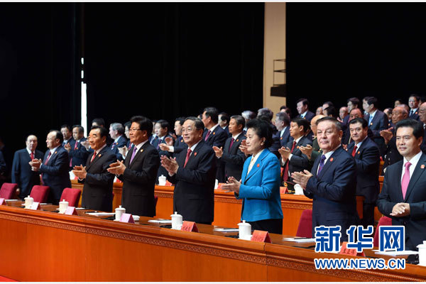 10月1日，慶祝中華人民共和國成立66周年暨新疆維吾爾自治區成立60周年大會在新疆人民會堂隆重舉行。 新華社記者 饒愛民 攝 