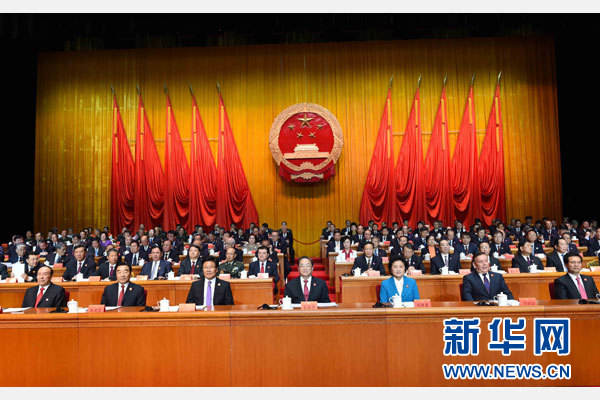 10月1日，慶祝中華人民共和國成立66周年暨新疆維吾爾自治區成立60周年大會在新疆人民會堂隆重舉行。 新華社記者 饒愛民 攝