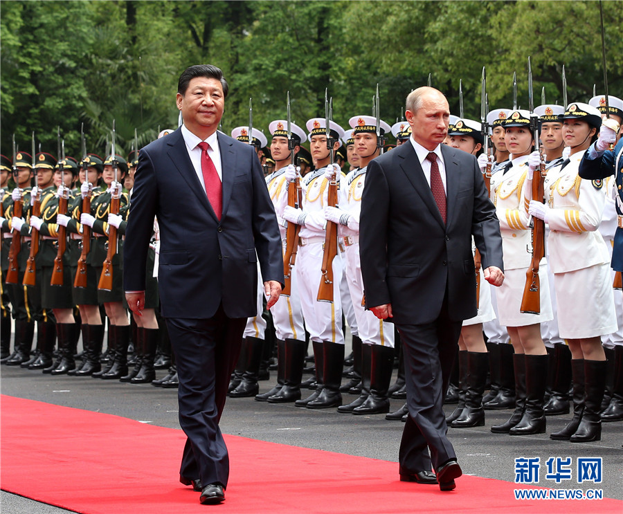 這是會談前，習近平在上海西郊會議中心廣場為普京舉行歡迎儀式。 新華社記者 龐興雷 攝 