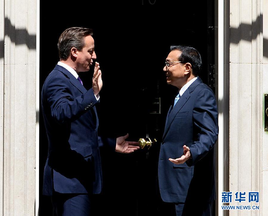 6月17日，中國國務(wù)院總理李克強在倫敦唐寧街10號首相府同英國首相卡梅倫舉行中英總理年度會晤。新華社記者 李濤 攝