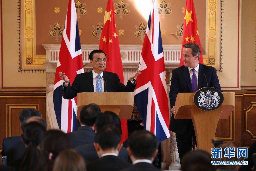 6月17日，國務院總理李克強同英國首相卡梅倫在倫敦舉行中英總理年度會晤后共同會見記者。新華社記者 龐興雷 攝