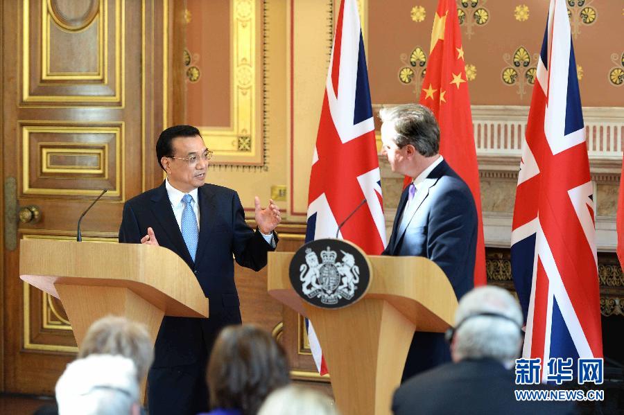 6月17日，中國國務院總理李克強同英國首相卡梅倫在倫敦舉行中英總理年度會晤后共同會見記者。新華社記者 李濤 攝